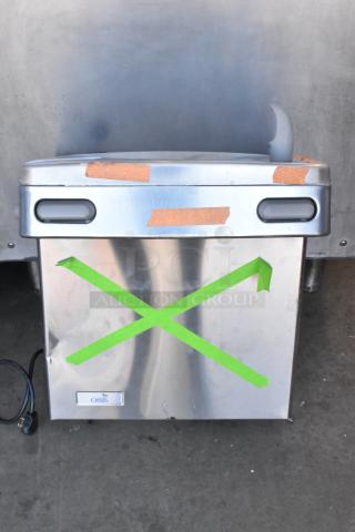 BRAND NEW Oasis PWEBF-005 stainless steel water fountain; scratch and dent; wall mount; green tape marking; visible dents.