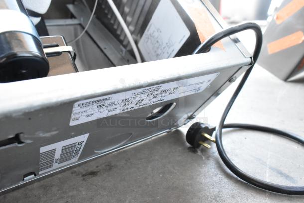 BRAND NEW Oasis PWEBF-005 stainless steel wall mount water fountain, scratch and dent condition, with visible wiring and labels.