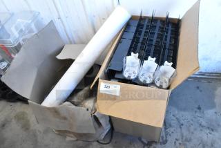 Lot of 2 boxes with various items, including poly drink sliders. Boxes show slight wear. "220" label visible on one box.