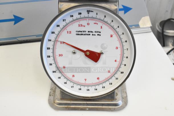 Marco SW10211 metal countertop food portioning scale, 30lb/13.5kg capacity, 2oz/50g graduation, in used condition.