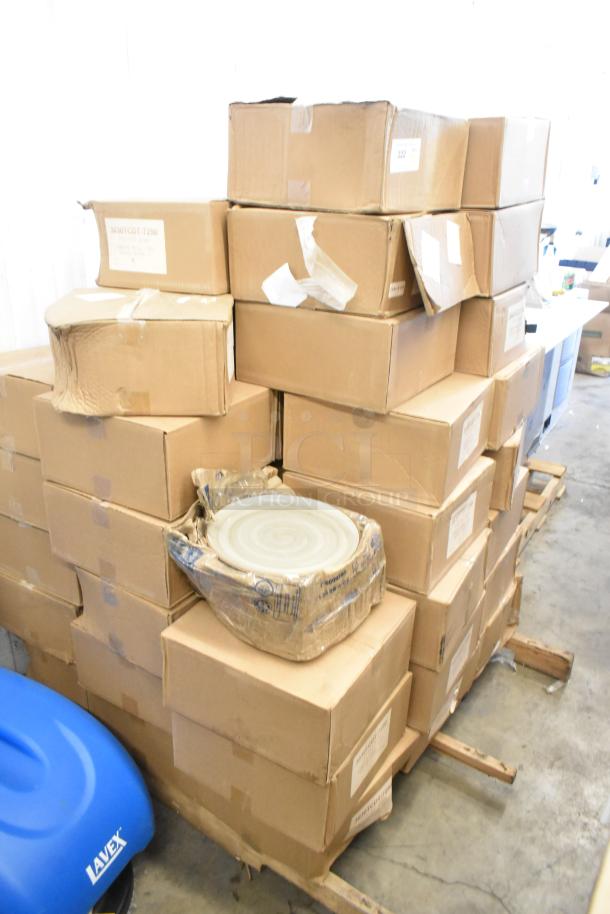 56 brand new boxes of 3030TCDT-7250 3"x3" label rolls, stacked on pallets.