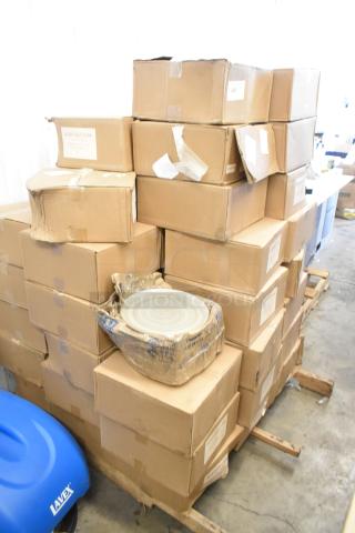 56 brand new boxes of 3030TCDT-7250 3"x3" label rolls, stacked on pallets.