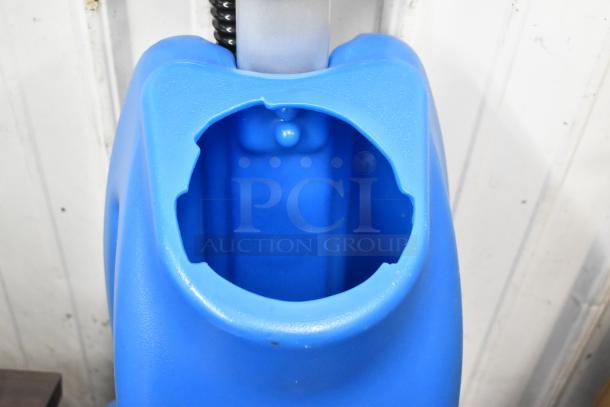 Lavex 274AFS3BAT push behind floor scrubber, blue tank, 120V, 1 phase, in good condition, notable for effective cleaning.