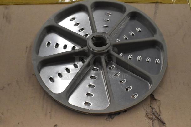 Metal food processor blade, featuring multiple slicing holes. Part of a set of 4 blades: 2 slicing, 2 grating.
