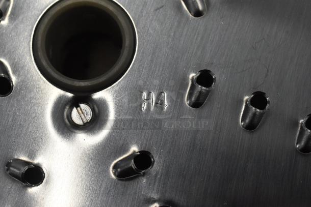 Four metal food processor blades, two slicing, two grating, marked "H4," in excellent condition for versatile food preparation.