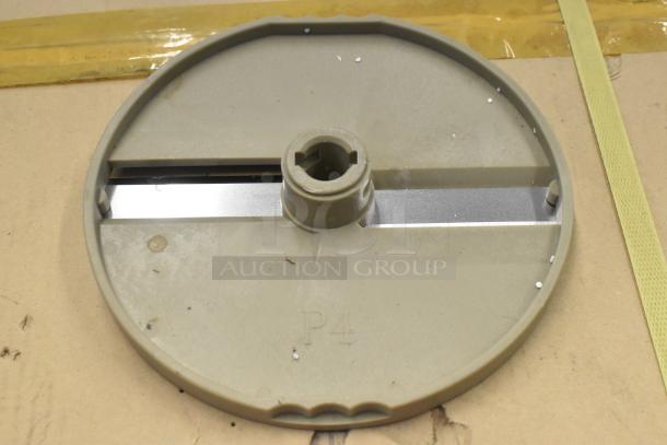 4 metal food processor blades; 2 slicing, 2 grating. Circular design, embossed "P4." Lightly used condition.