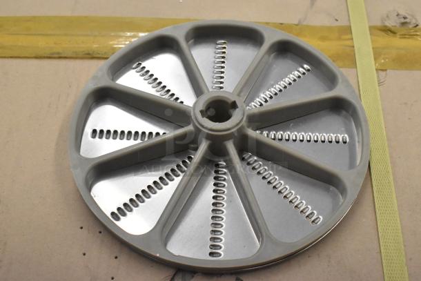 Set of 4 metal food processor blades; includes 2 slicing and 2 grating. Durable stainless steel, excellent condition. Multiple bid value.