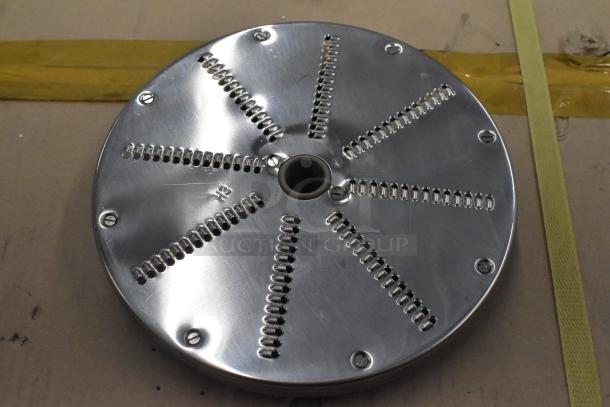 Four metal food processor blades, including 2 slicing and 2 grating. Polished finish with visible "H3" marking.