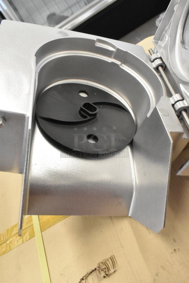Robot Coupe metal continuous feed head for food processor, metallic finish, new condition, with visible blade mount.