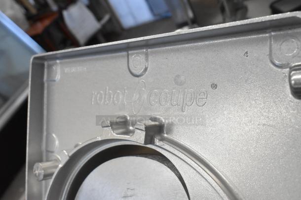 Robot Coupe metal continuous feed head for food processor, silver finish, embossed logo visible, excellent condition.