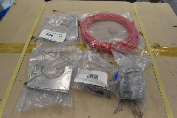 Five brand new scratch and dent items, including Dormont RV48CL gas regulator, metal. Quantity tag showing "236 QTY 5."