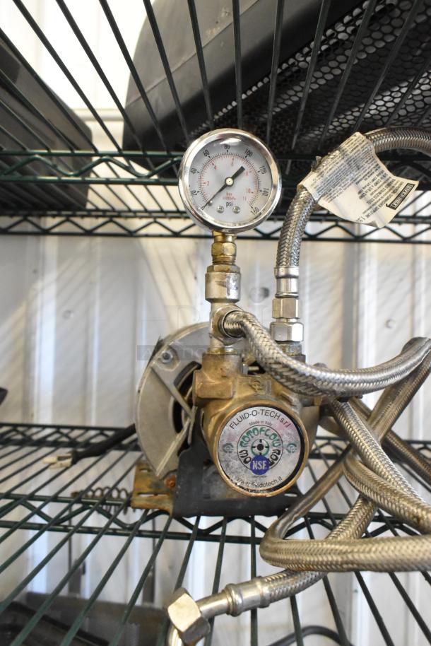 Marathon 5KH32GNB811BX Motor, 100-120/200-240V, 1 Phase. Features Fluid-O-Tech pump and pressure gauge. Mounted on metal shelf.