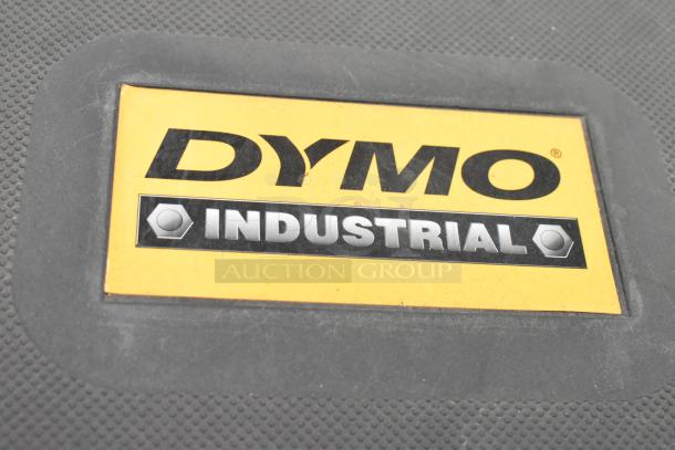 Dymo RhinoPro 5000 Label Printer in hard case, features durable industrial design. Visible Dymo Industrial label on case.