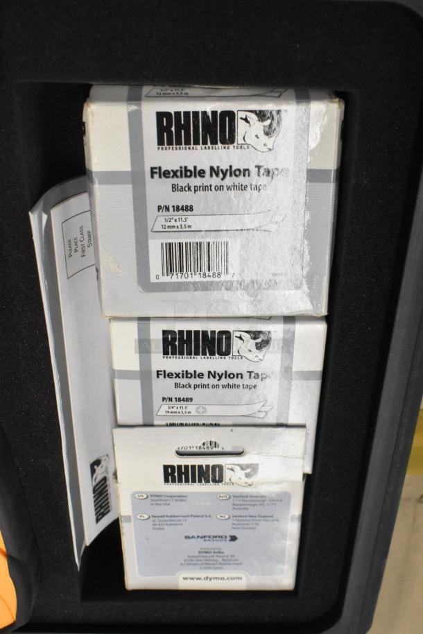 Dymo RhinoPro 5000 Label Printer Hard Case with Flexible Nylon Tape, labels show parts P/N 18488 and P/N 18489.