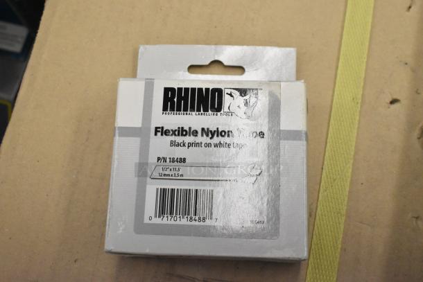 Dymo RhinoPro 5000 label printer in hard case. Features flexible nylon tape, P/N 18488, black on white.