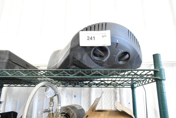 Living Zone BFGF-15D Quartz Heater on shelf, 115V, 1 Phase. Adjustable thermostat, labeled with auction tag number 241.