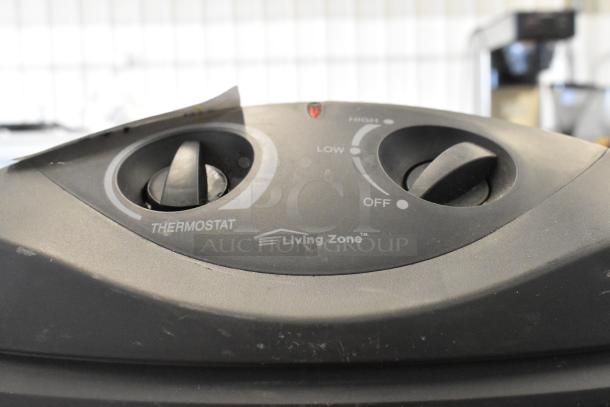 Living Zone BFGF-15D Quartz Heater controls, showing thermostat dial and settings. 115 Volts, 1 Phase. Good condition.
