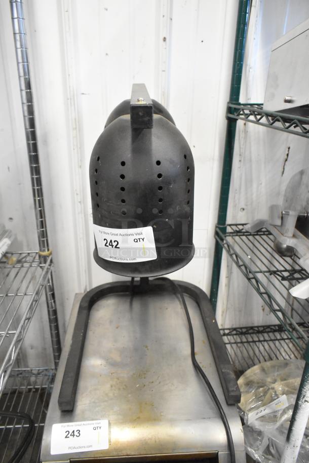Avantco 177W62BLK metal countertop 2 head food warmer, black finish, 115 volts, 1 phase. Tags indicate auction details, some visible wear.