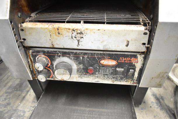 Hatco TQ-800HBA metal commercial conveyor toaster oven, used condition with visible wear, 208 volts, 1 phase.