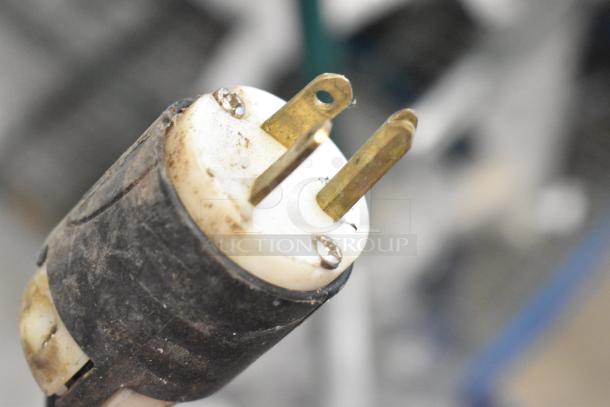 Electrical plug of Hatco TQ-800HBA conveyor toaster. Standard two-prong design, signs of wear. 208V, 1 Phase.