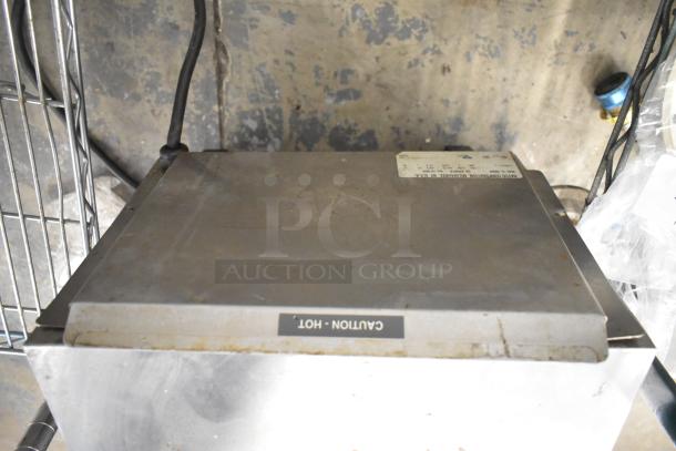 Hatco TQ-800HBA conveyor toaster oven, metal, commercial countertop, 208V, 1 phase, "Caution Hot" label visible.