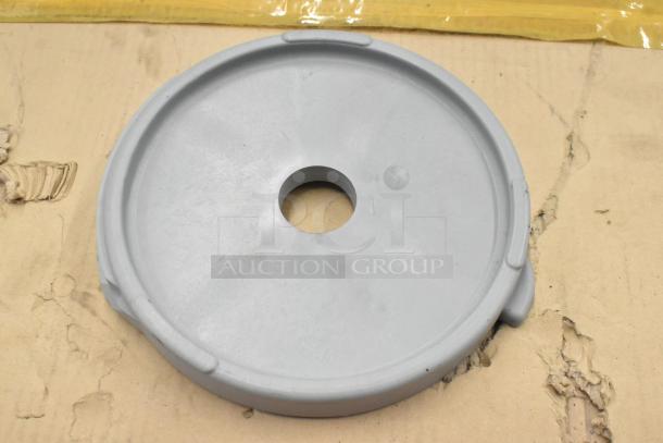 Gray S blade for food processor, circular design, central hole visible, good condition, essential for slicing tasks.