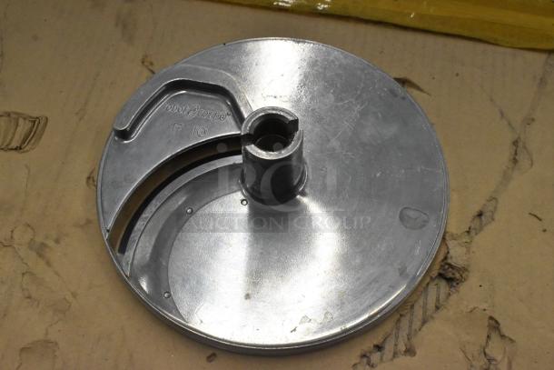 Food processor slicing blade, metal, marked "Robot Coupe F10." Good condition, suitable for food processing.