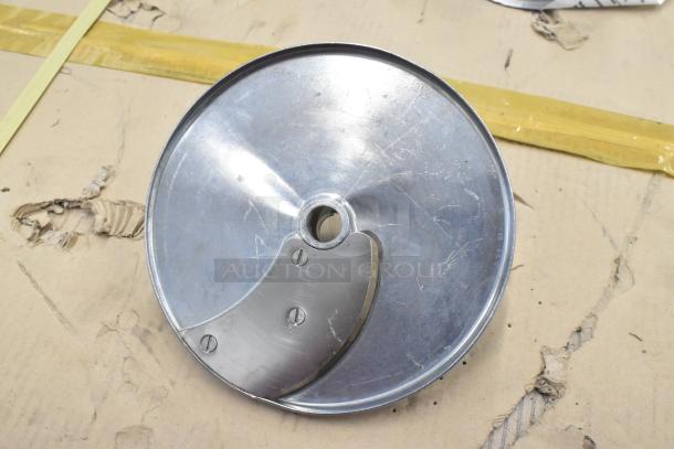 Food processor slicing blade, metal, circular with central hole, used condition, includes S blade and two other items.