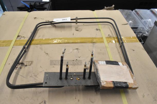 Blodgett 8595 Element Assy in used condition. Features include metal assembly and connectors. Packaging label included.