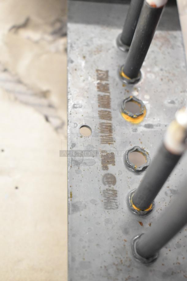 Blodgett 8595 Element Assy in metal with multiple rods, visible wear, and engraved specifications on the plate.