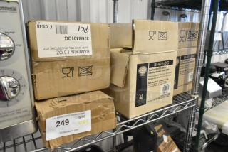 Boxes of 5 new items including 375B401DG GET Enterprises dark gray melamine ramekins on a metal shelf, labeled for auction.