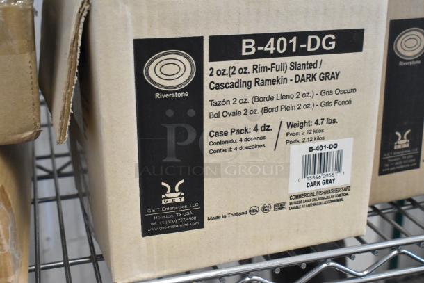 GET Enterprises B-401-DG Riverstone 1.5 oz. Dark Gray Matte Melamine Ramekin box on a shelf, label visible, new condition.