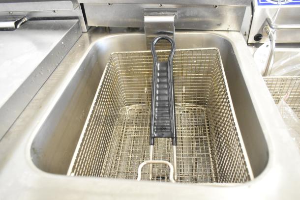 Brand new Avantco 177F202 stainless steel 2-bay fryer with metal basket. Electric, 208-240V, 1 phase, countertop model.