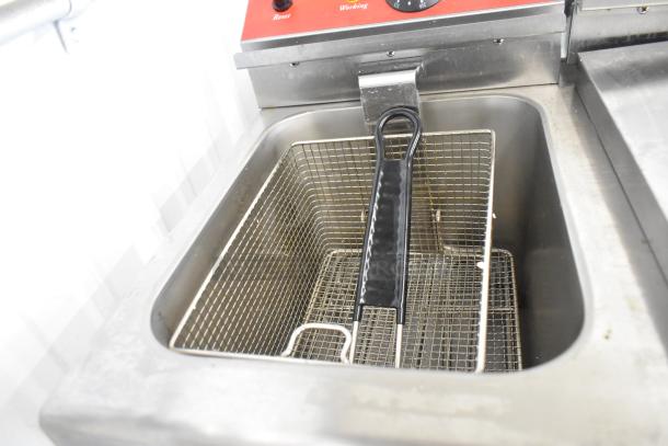 Avantco 177F202 stainless steel 2-bay fryer with a wire basket, brand new, 208-240V, 1 phase.