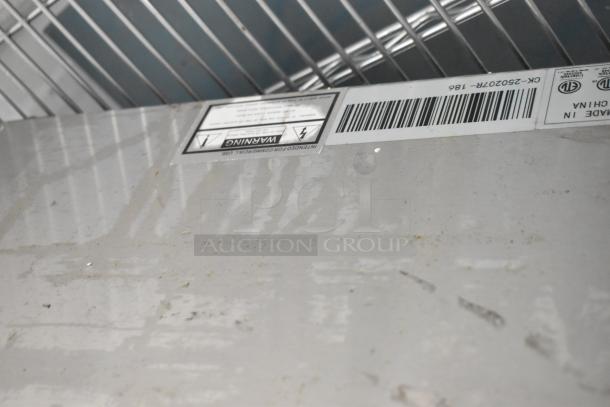Brand new Avantco 177F202 stainless steel 2-bay fryer, electric, with visible scratch and dent, includes labels and warnings.