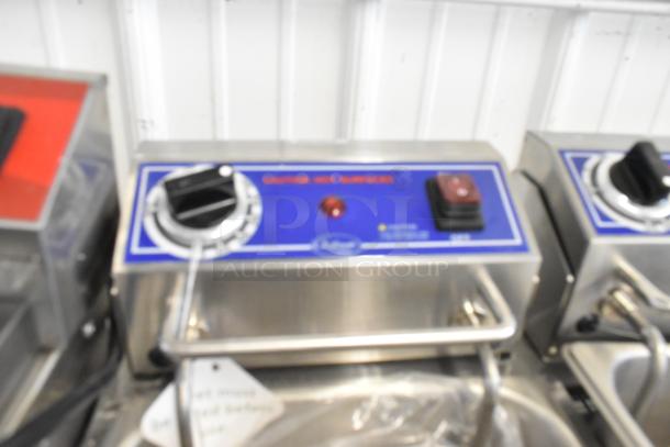 Brand new Globe PF32E stainless steel countertop electric fryer with controls, 2 metal baskets, 208-240V, 1 Phase.