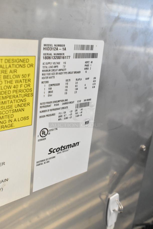 2018 Scotsman HID312A-1A stainless steel commercial Meridian nugget ice & water dispenser, visible serial number.