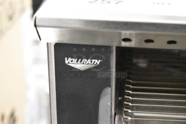 Vollrath JT1 stainless steel conveyor toaster oven, features durable construction, 120 volts, 1 phase, visible branding.