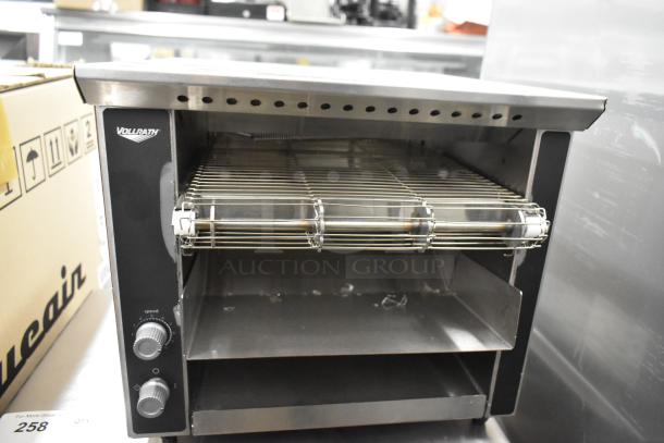 Vollrath JT1 stainless steel commercial conveyor toaster oven, 120V, 1 phase, features dual control knobs, good condition.