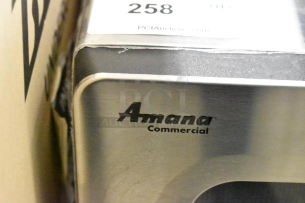 2021 Amana RMS10DSA stainless steel commercial countertop microwave, showing Amana logo and auction tag.