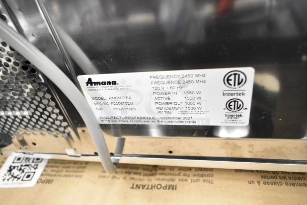 2021 Amana RMS10DSA stainless steel commercial countertop microwave oven, 120 volts, ETL certified, model label visible.