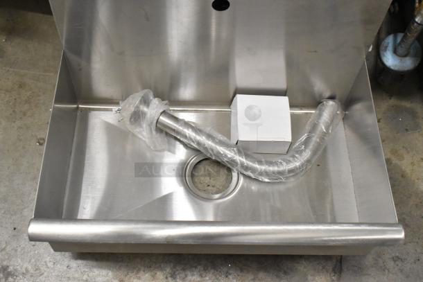 Stainless steel single bay wall mount sink, new condition, includes pipe and box, missing one bracket, scratch and dent.