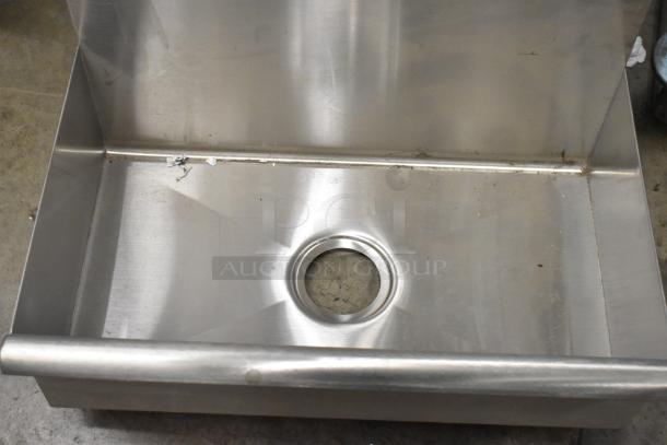 New stainless steel single bay wall mount sink, scratch and dent, missing one bracket.