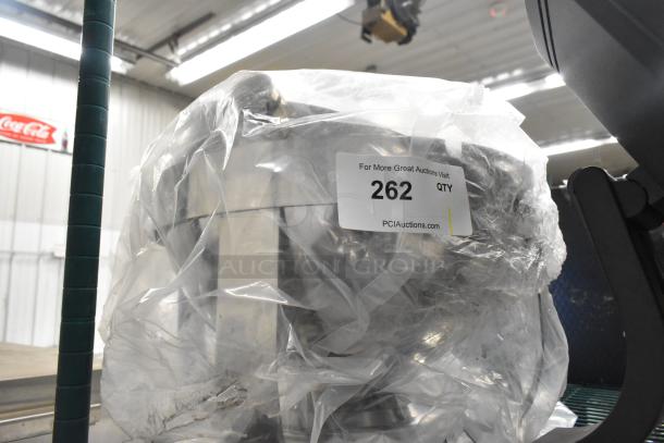 Brand new stainless steel countertop round roll top chafer, visible under plastic wrap, labeled for auction as item 262.