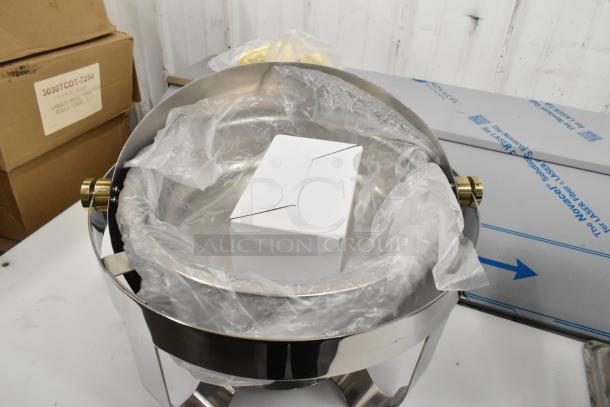 Brand new stainless steel countertop round roll top chafer, with minor scratches and dents, in packaging.