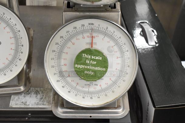 2 Yamato SM(N) metal countertop food portioning scales, 30lb capacity, "This scale is for approximation only" label visible.