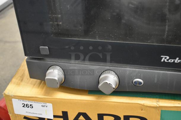 2021 Cadco Unox XAF003 Roberta convection oven, countertop model, electric, 120V, 1 phase, with control knobs visible.