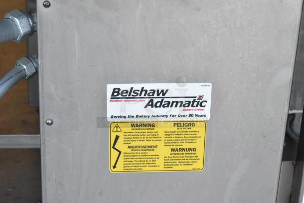 2017 Belshaw Adamatic TG50 Thermoglazing Station, stainless steel, commercial casters, 208V 1-phase. Warning labels visible.