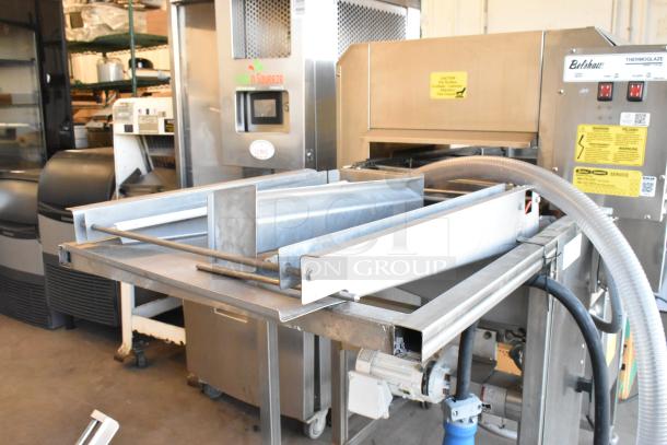 2017 Belshaw Adamatic TG50 stainless steel thermoglazing station on casters, 208V, 1 phase, in good condition, visible control panel.
