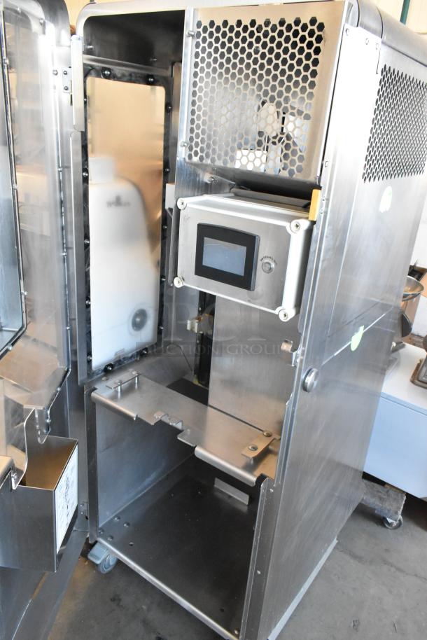 JBT Fresh N Squeeze 2ND-GEN-MFJ stainless steel citrus juicer on casters, with control panel, 120V, 1 phase, used condition.